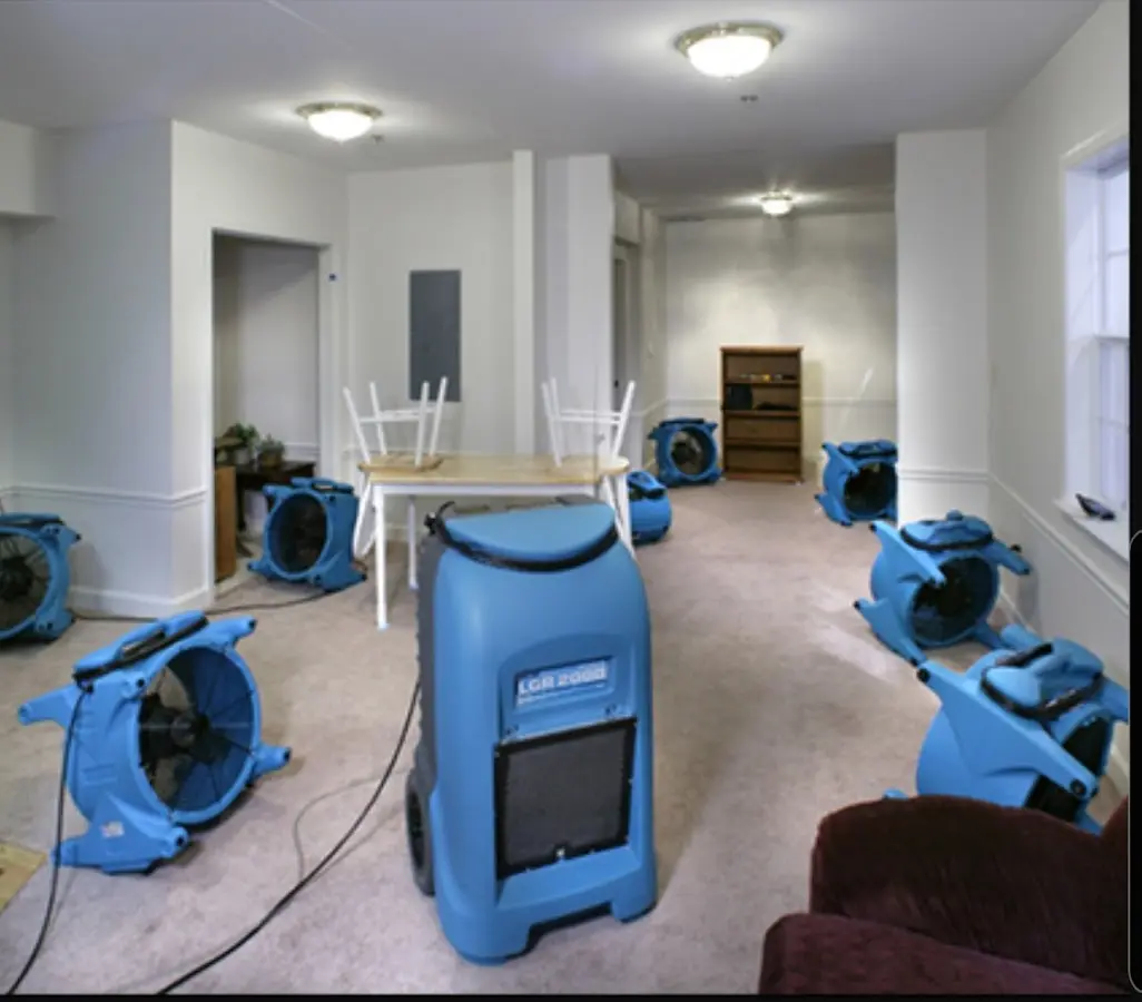 Air movers and dehumidifier setup for Water Damage Restoration in East Providence